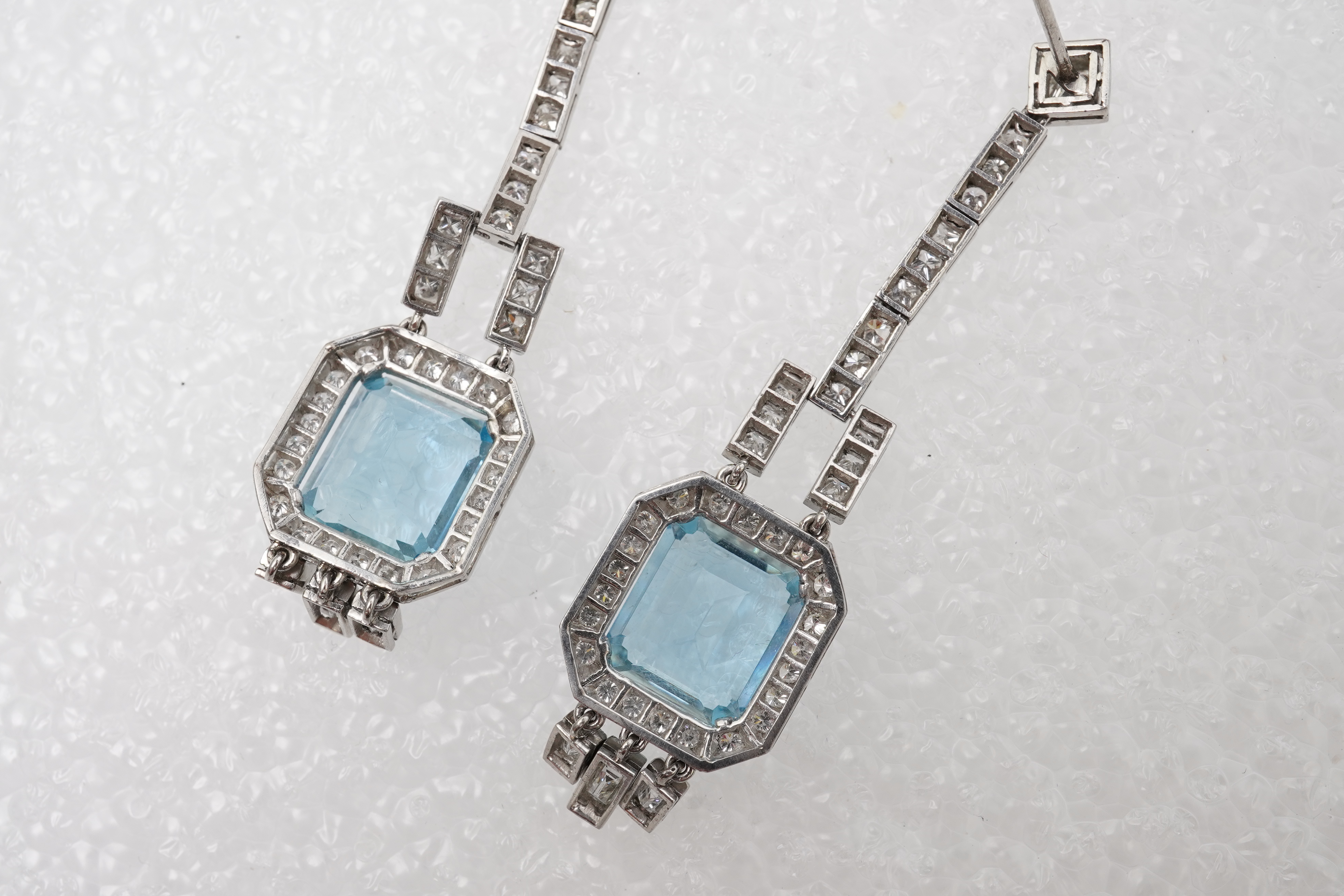 An attractive pair of aquamarine and diamond earrings